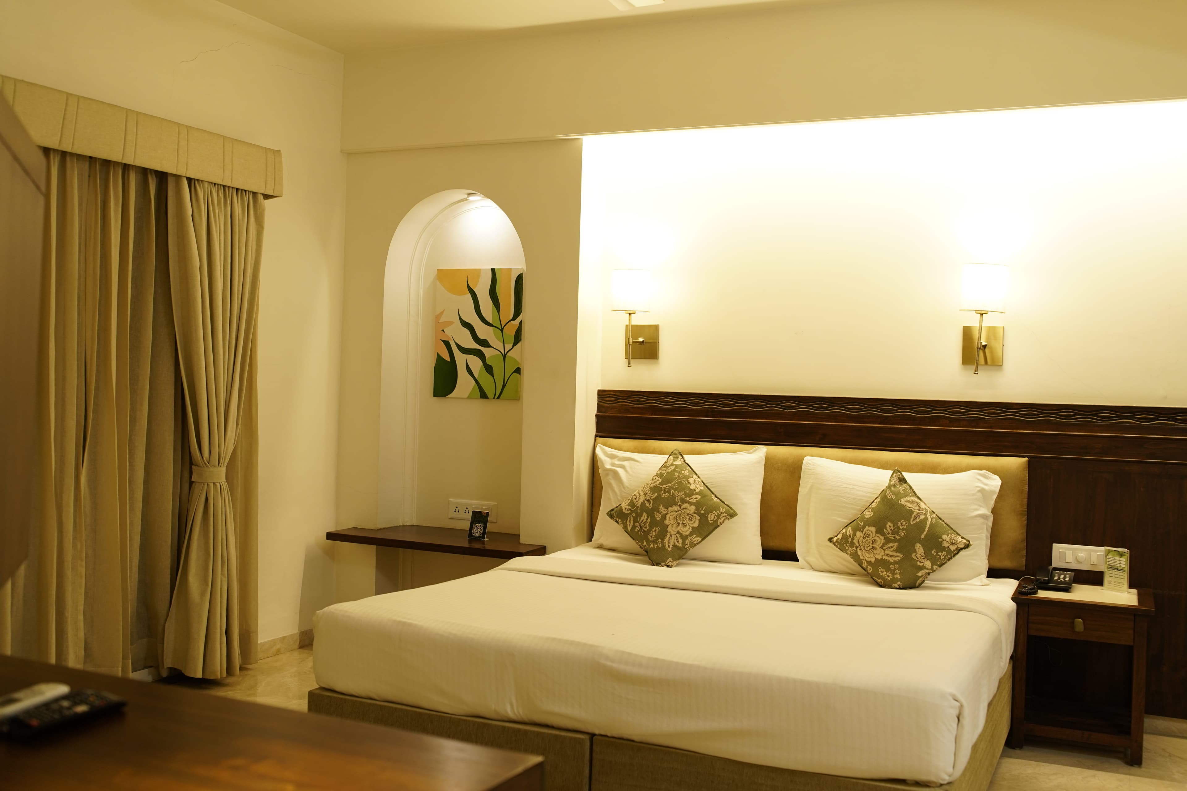 Suite room with warm beige styling and spacious layout